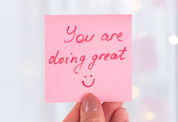 inspirational quotes on pink sticker on the mirror,handwriting text