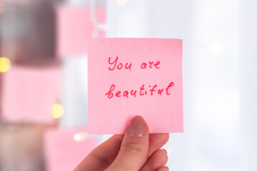 inspirational quotes on pink sticker on the mirror,handwriting text