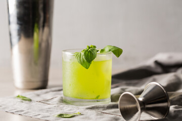 Gin Basil Smash Cocktail refreshment gin, fresh lemon juice, syrup and basil leaves