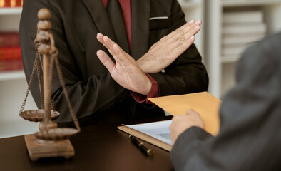Businessman refusing money that comes with agreement paper, Anti bribery, and Anti Corruption...