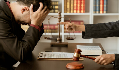 Consulting and finding a solution Concept, businesspeople consult with a lawyer or judge to find...