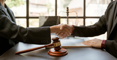 Consulting and finding a solution Concept, businesspeople consult with a lawyer or judge to find...