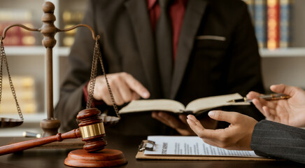 Attorney reading law code, studying constitution to protect human rights closeup, Male lawyer or judge working with Law books, gavel