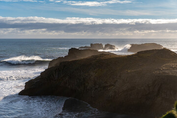 Dyrhólaey (Dyrholaey, Door Hill Island, Cape Portland), small promontory located on south coast of Iceland, near Vik.	