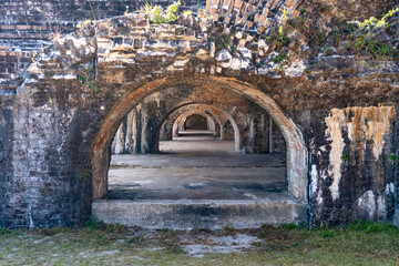 Gulf Islands National Seashore along Gulf of Mexico barrier islands of Florida. Fort Pickens pentagonal historic United States military fort on Santa Rosa Island. Brick casemate arches. 