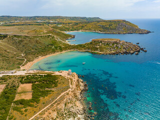 Landscape view of popular Maltese beach - Ghain Tuffieha. Malta