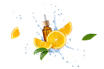 Brown bottle of face serum with vitamin C or essential oil and orange slices  flying in splashing...