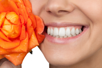 Closeup on a Woman Smiling Mouth with Flower