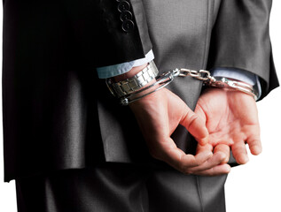 Hands of Businessman in Handcuffs