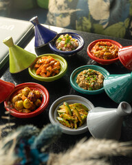 Selection of fresh Moroccan dips and starters, olives, courgette, tomato, aubergines and salad