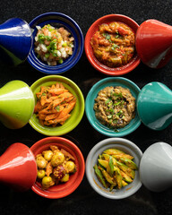 Selection of fresh Moroccan dips and starters, olives, courgette, tomato, aubergines and salad