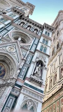 Vertical video of the real Renaissance 
 masterpiece - fasade Santa Maria del Fiore on the Piazza del Duomo in Florence, Tuscany region, Italy.