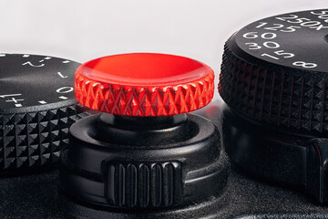 Close up high resolution macro photography of a camera control knobs and dials