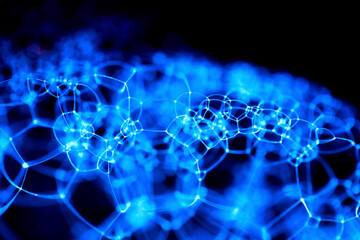 Obraz premium UVIVF Colorful Bubbles shining with fluorescent paint illuminated by UV 365nm ultraviolet blacklight photographed in a studio with a macro lens