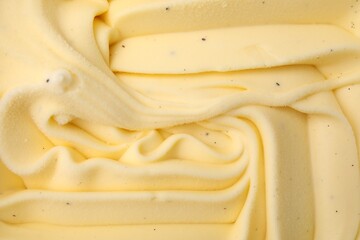 Delicious vanilla ice cream as background, top view