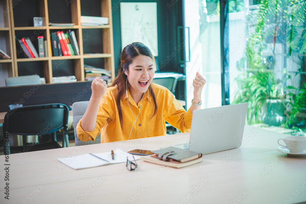 Poster business woman sitting online working on a laptop showing joy Successful workplace, customers accept proposals, work goals