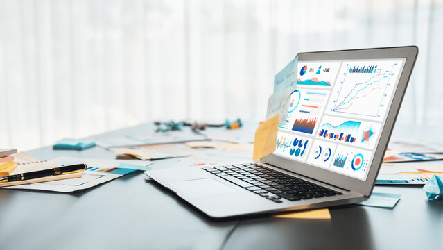 Sticky note for creative and analytic brainstorm for business idea with BI data dashboard on laptop screen. Analysis financial data visualization tech for marketing strategy. Prodigy