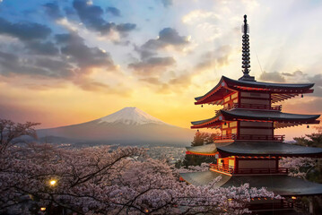 Fototapeta na wymiar Fujiyoshida, Japan Beautiful view of mountain Fuji and Chureito pagoda at sunset, japan in the spring with cherry blossoms