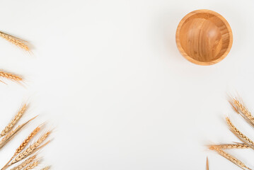 wheat on white table background top view