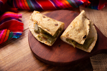 Quesadilla de Comal con queso y Nopales. Typical Mexican quesadilla made on a comal, very popular dish, one of the main street food in Mexico.