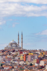 Suleymaniye mosque with colorful residential house area in Istanbul with blue sky background, Turkey, Istanbul Mosque Suleymaniye minaret with colorful house, Beautiful view Istanbul, Turkiye.