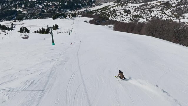 Drone Of Skier Skiing Down Mountainside