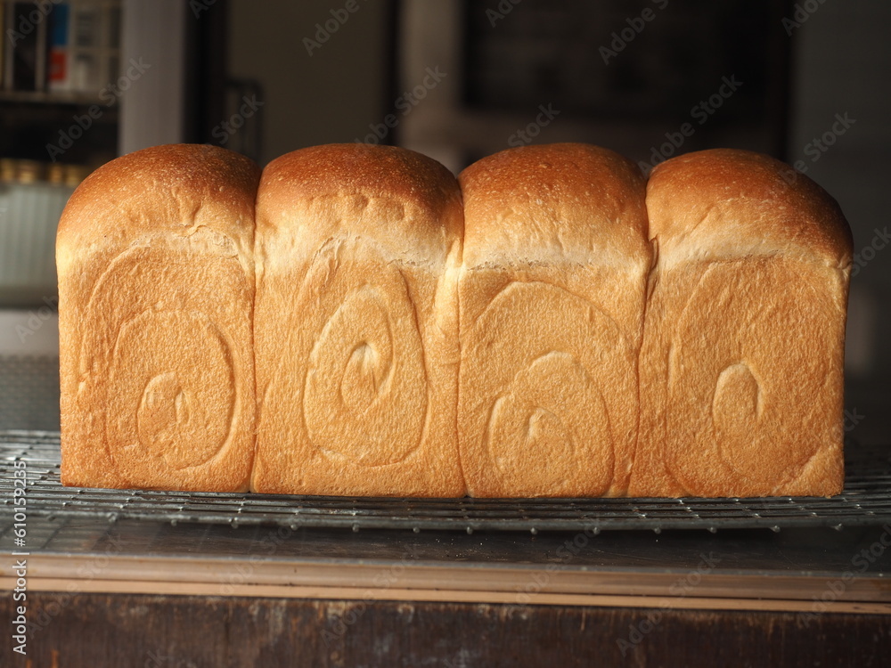 Wall mural pull apart white bread loaf