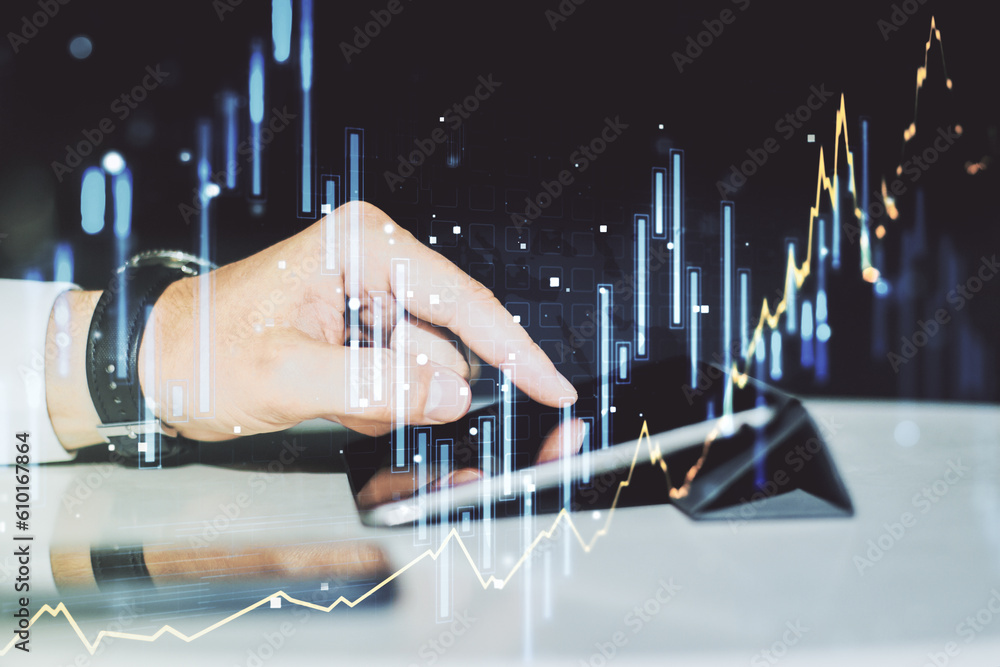 Poster multi exposure of abstract financial graph and hand working with a digital tablet on background, fin
