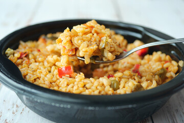 bulgur rice with tomato on a plate ,