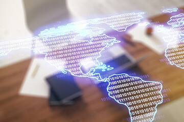 Digital America map and modern desktop with computer on background, international trading concept. Multiexposure