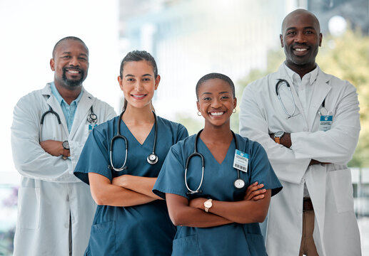 Healthcare, teamwork and portrait of doctors with crossed arms for medical care, wellness and support. Hospital, happy and men and women health worker for cardiology service, consulting and medicare