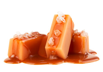 Delicious candies with caramel sauce and sea salt isolated on a white background