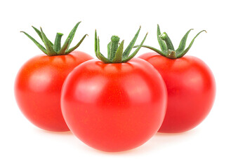 Three ripe red tomatoes isolated on a white background. Cherry tomatoes.