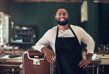 Barber shop, hair stylist smile and black man portrait of an entrepreneur feeling happy. Salon,...
