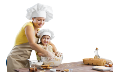 Happy mother and child daughter preparing the dough in the kitchen