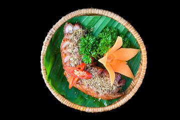 Fototapeta premium Braised pork belly with lemongrass isolated on black background