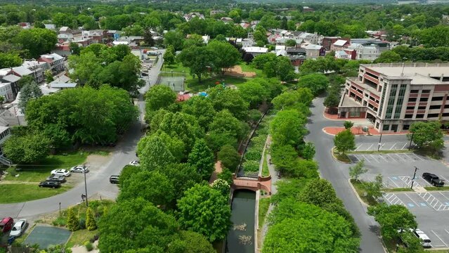 Carroll Creek Linear Park and town public pool. Aerial view on summer day in Frederick Maryland. Frederick MD.
