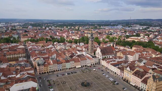 Fountain in the center of the historic market square. Lovely aerial top view flight 
Budweis Budejovice old town in Czech Republic, summer of 2023. panorama overview drone
4K uhd footage.