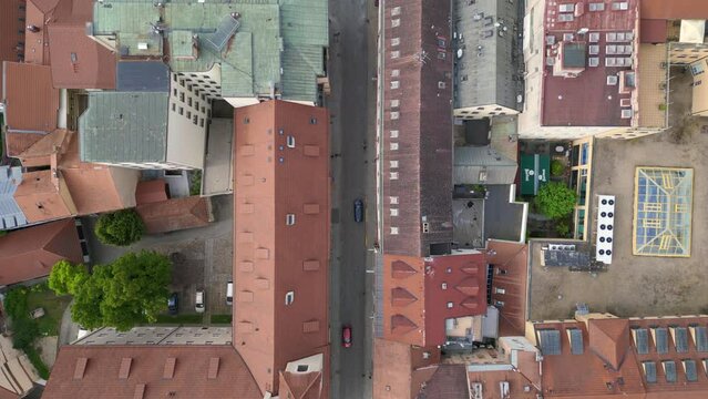 Street to City Hall at the historic market square. Nice aerial top view flight 
Budweis Budejovice old town in Czech Republic, summer of 2023. vertical bird's eye view drone
4K uhd footage.
