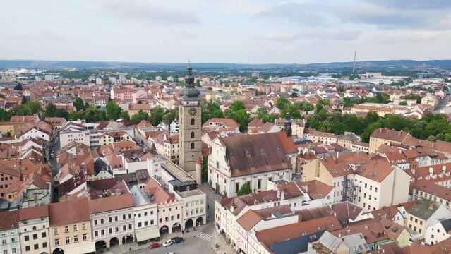 tower at the historic market square. Perfect aerial top view flight 
Budweis Budejovice old town in Czech Republic, summer of 2023. fly reverse drone
4K uhd footage.