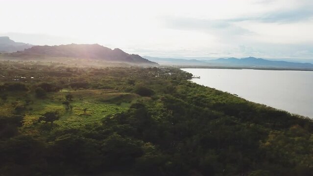 Nadi Fiji Bula holiday vacation island paradise aerial drone cinematic sunrise morning beautiful peaceful relaxing honeymoon adventure resort lagoon mountain beach jungle circling left movement