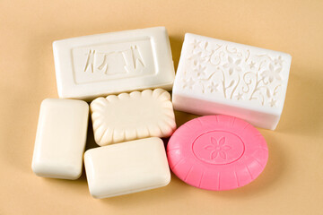 A set of different soaps. A lot of different toilet soap.
