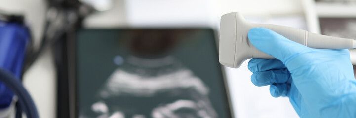 Ultrasound picture and doctor transcranial dopplerography of child in womb. Examination of fetus of child concept