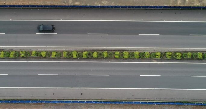 Aerial photography of cars driving on a section of highway