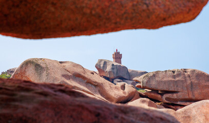 travel destination in Brittany,  pink granite rock and lighthouse- Brittany in France, Ploumanach