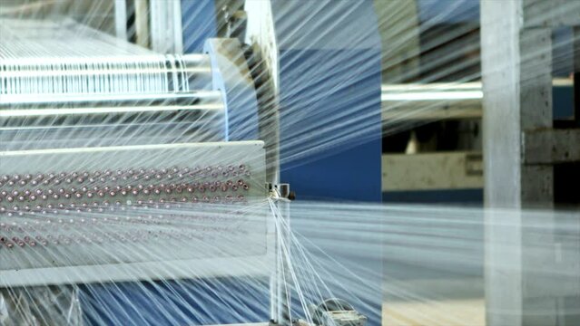 Yarn warping machine in textile weaving factory. 