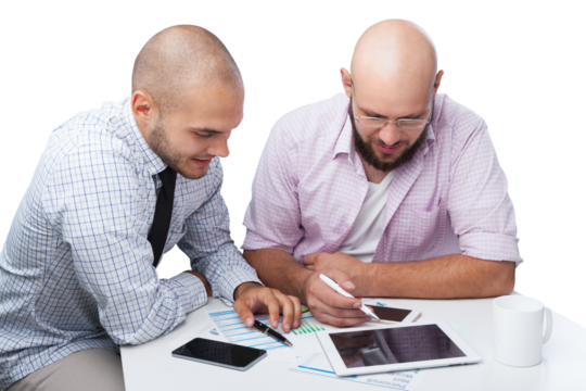 Team of serious businesspeople working on office desk