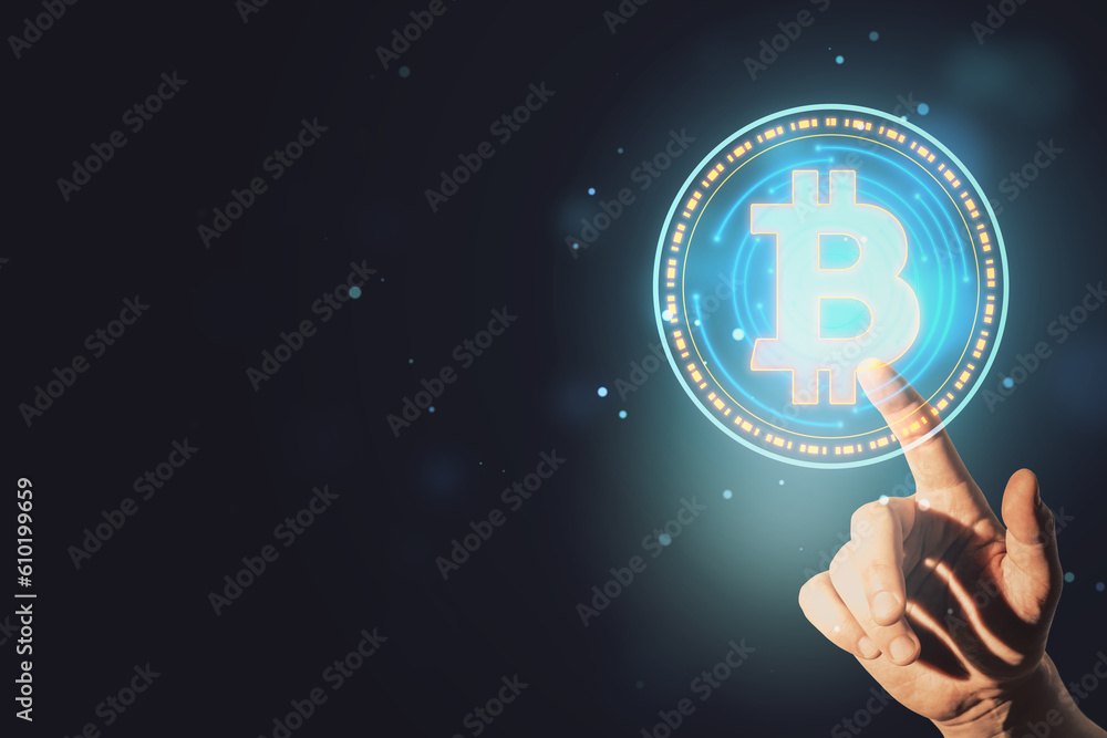 Poster close up of male hand pointing at glowing round bitcoin sign hologram on dark bokeh background with 