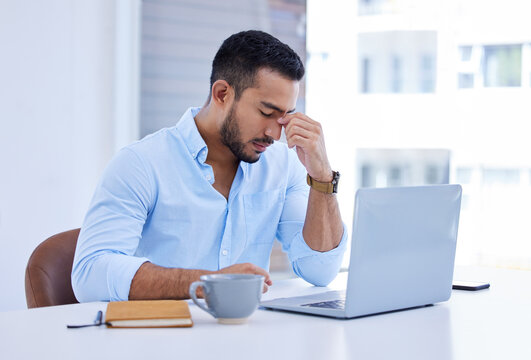 Headache, stress and business man on computer with mental health problem, burnout or fatigue in office. Brain fog, tired and pain or migraine of corporate person on laptop for mistake, debt or crisis