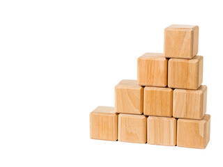 Stacking wooden cubes as pyramid as business concept for a successful growth process isolated on transparent
